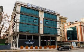 Arena Luxury Suites Hotel